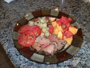 Tri-Tip with Roasted Garlic Potatos, Fruit Salad, and Fresh Tomatos